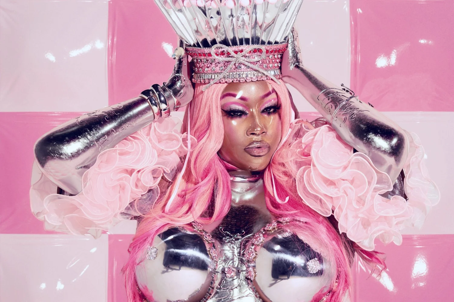 CupcakKe concert promotional portrait in pink and silver