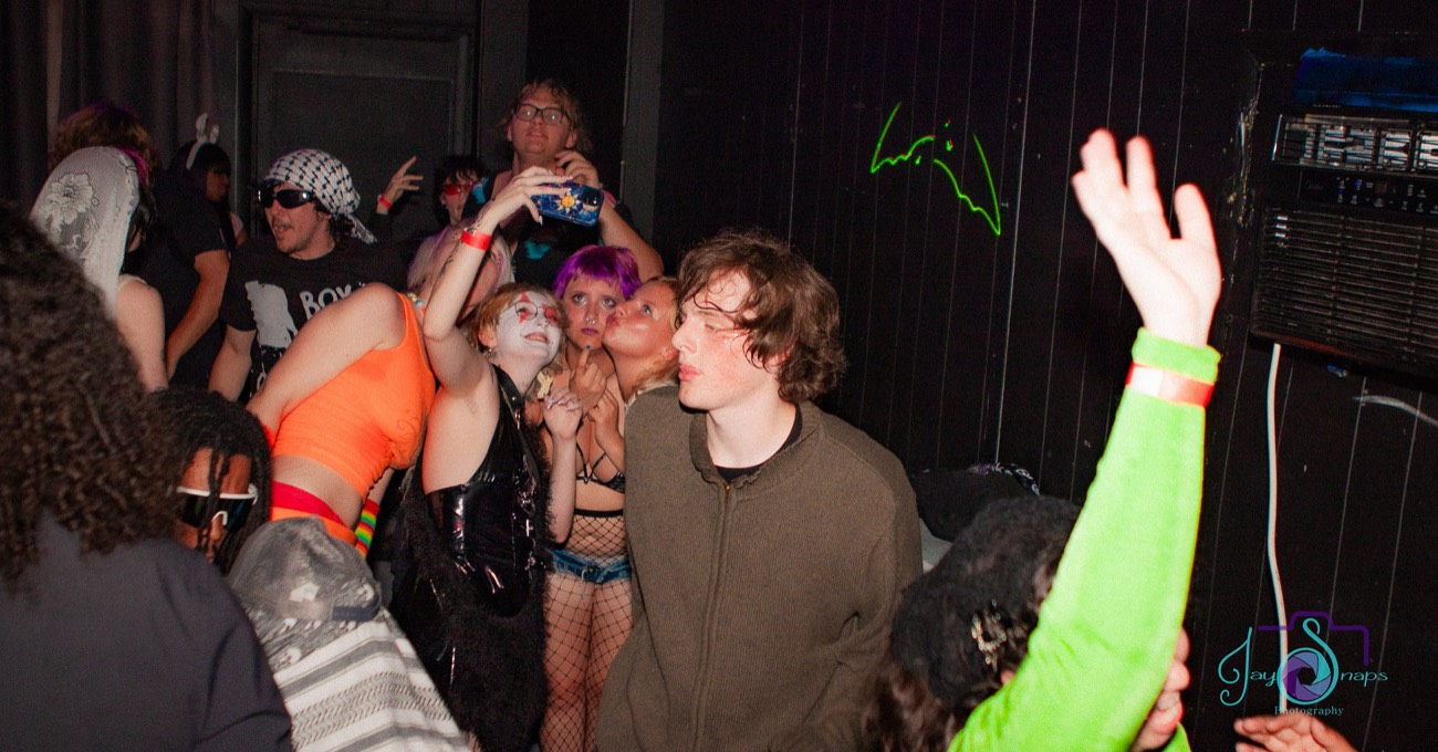 Chronically Online crowd photo by Jay Snaps