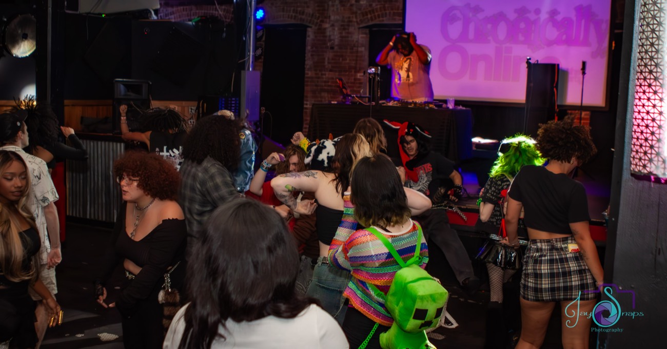 Chronically Online crowd photo by Jay Snaps