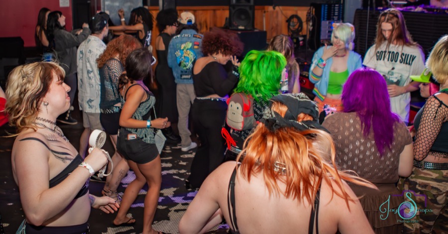 Crowd at a Chronically Online party